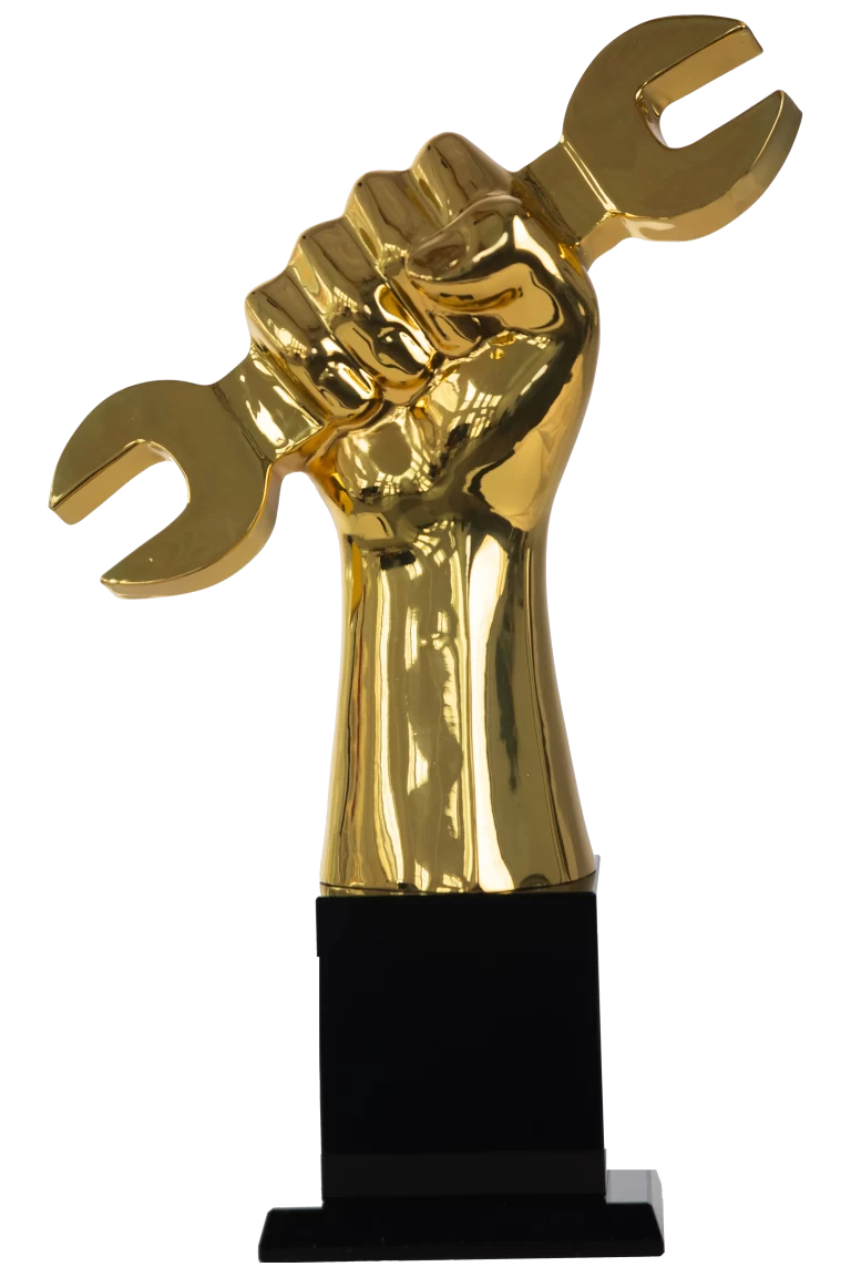 The Golden Wrench Award trophy: A golden hand holding a golden wrench on a blue background.